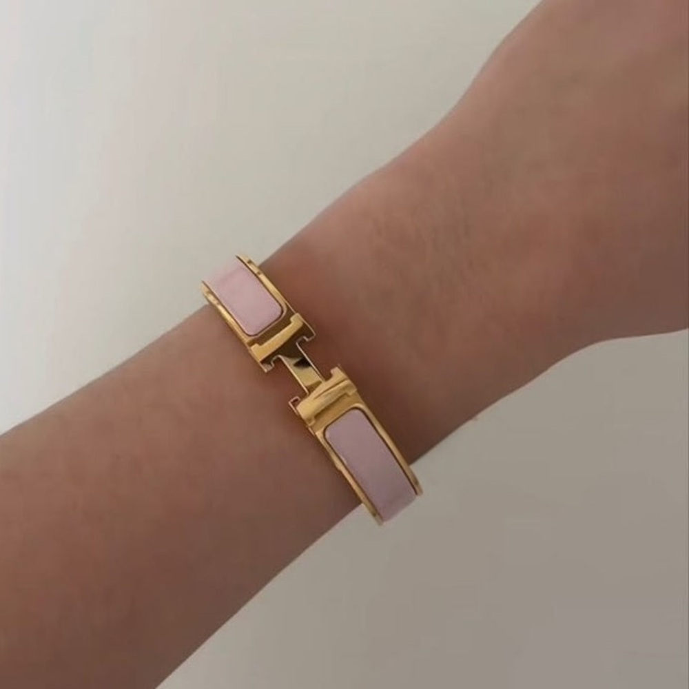 New Clic H Bracelet gold plated stainless steel in gold & pink